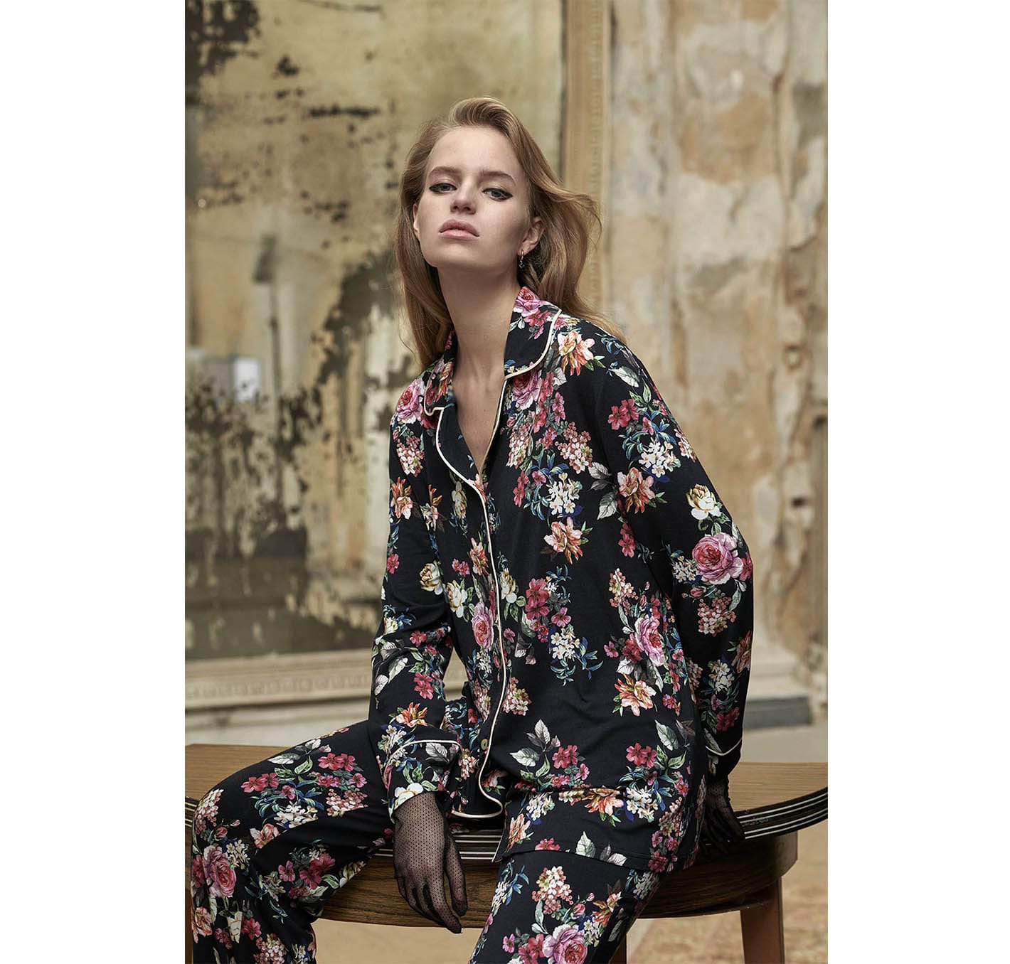 woman in floral vamp clothing